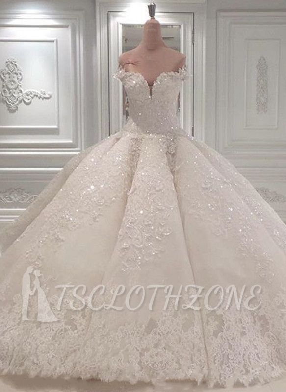 Trägerloses, funkelndes, durchsichtiges Ballkleid-Hochzeitskleid mit luxuriöser Schleppe